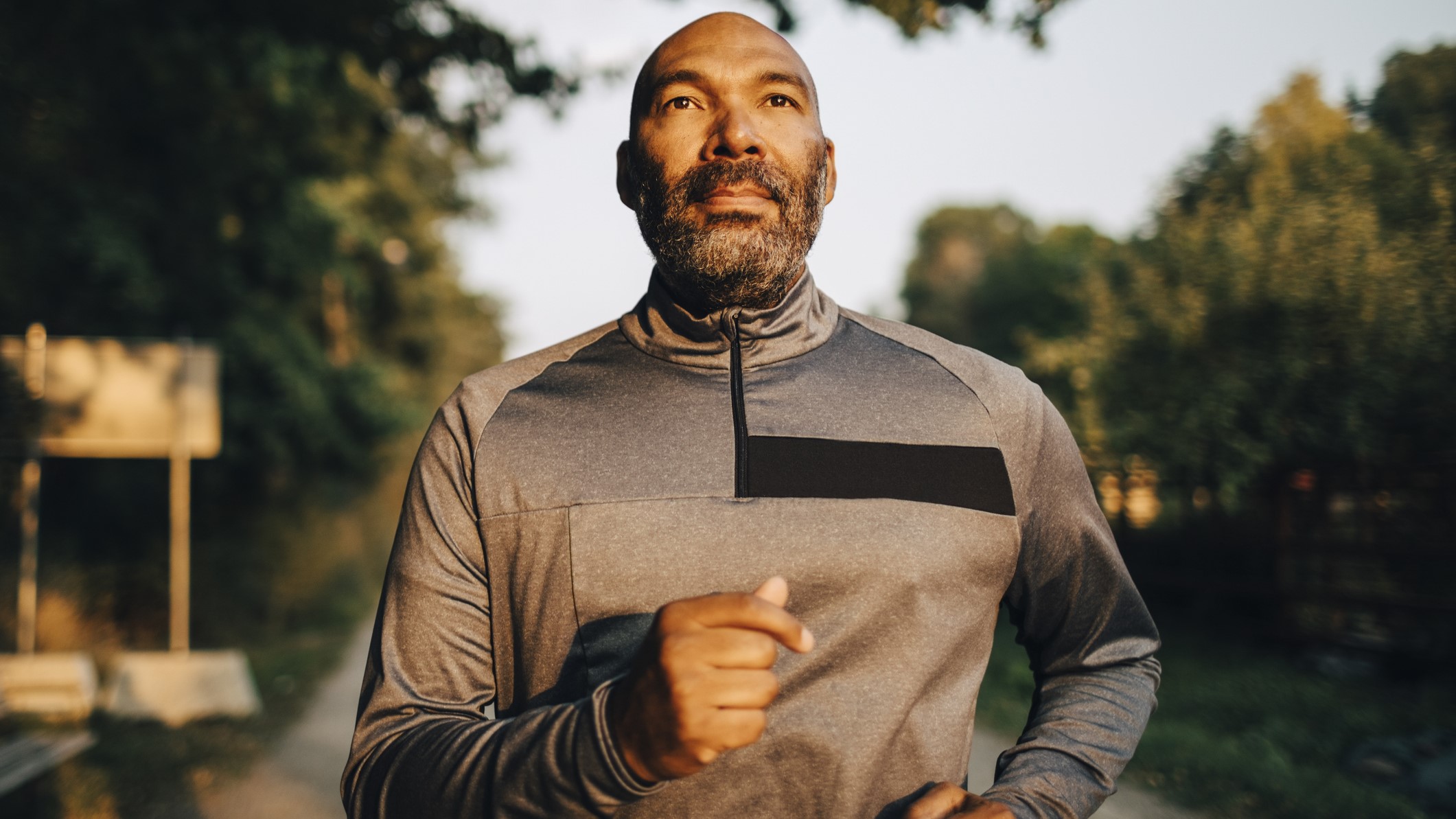 Man jogging, looking resolute